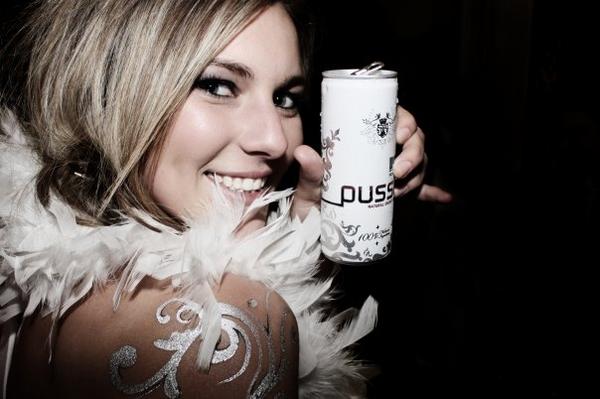 Young woman holding a can of Pussy Natural Energy